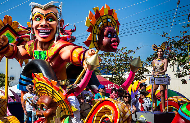 Barranquilla, Colombia - March 1, 2014 - Colorful floats full of singers, dancers, and models make their way down the street during the Battalla de Flores. The pinnacle parade of the Carnival de Barranquilla.
