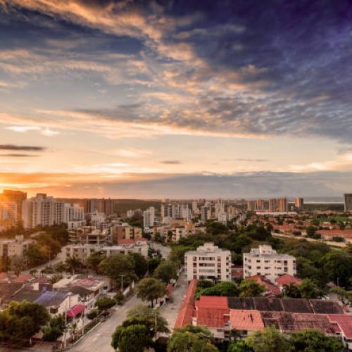 Aerial view of Barranquilla, Colombia towards the river at sunset